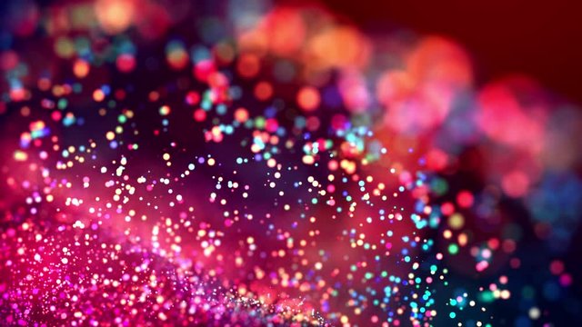 Abstract glitter 4k background with shining bokeh, sparkling multi colored particles for bright festive event. Use luma matte as alpha channel. Shallow depth of field. 61