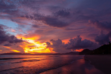 Beautiful vivid sky over the beach scenery with sea view, clouds, and waves. Nature beauty composition.