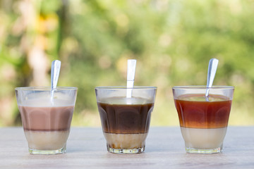 Hot drink, thai hot tea, hot black coffee, hot cocoa signature local street beverage on wooden table