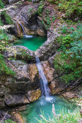 Detail view on Dlaouble Milk Bowl Waterfalls, Dvojna Latvica, of River Koritnica in Triglav National Park. Log pod Mangartom, Bovec, Slovenia. Europe.
