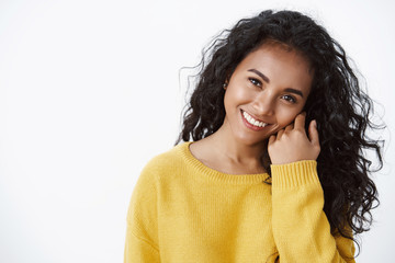Close-up attractive curly-haired african american woman feeling happy, smiling finally got rid...