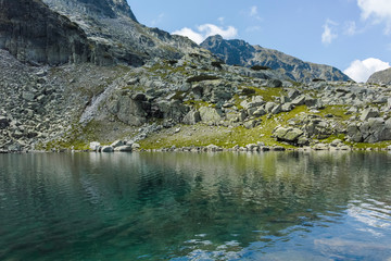Naklejka na ściany i meble Lake at the trail from Malyovitsa hut to Scary Lake, Rila Mountain