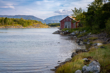 Fototapeta na wymiar Seahouse by the seashore in Northern Norway