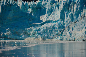 A close up of a Glacier in Alaska calving in a dramatic way. 