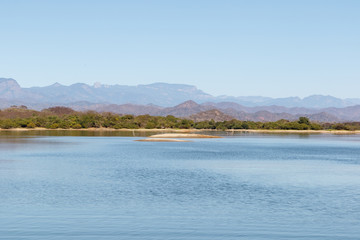 Fototapeta na wymiar Lake El Salto landscape scenics, Sinaloa, Mexico, with the Sierra Madre Mountains in the background