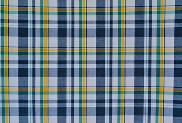 texture of fabric material with yellow, blue cells