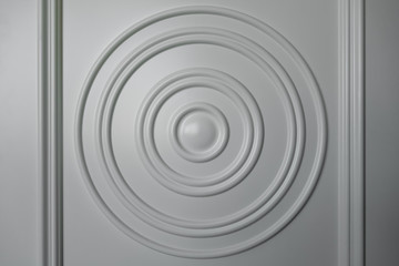 Textured relief pattern in the form of circles and lines of gray color. Creative vintage background.