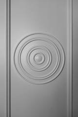 Textured relief pattern in the form of circles and lines of gray color. Creative vintage background.