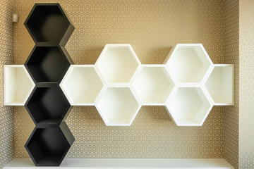 Wall shelves in the form of hexagons in white and black. Bee honeycombs.