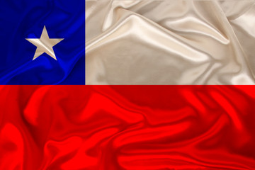 photo of the national flag of Chile on a luxurious texture of satin, silk with waves, folds and highlights, close-up, copy space, concept of travel, economy and state policy, illustration