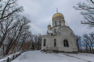 Beautiful Orthodox church in the winter at the top of the hill