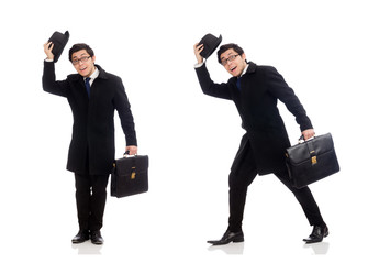 Young man holding suitcase isolated on white