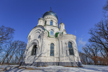 Fototapeta na wymiar Beautiful Orthodox church in the winter at the top of the hill