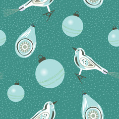 Retro Christmas ornaments seamless pattern in powder blue, teal and white.  Perfect for gift wrapping paper, tree skirts and holiday cards. Vintage glass decorations including clip on bird. Vector.