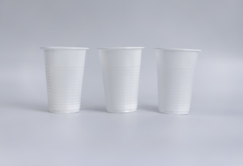 Plastic cups on a white background