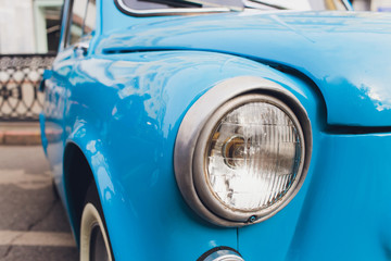 Obraz na płótnie Canvas Retro styled image of a front of a classic car.