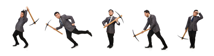 Young businessman holding a tool isolated on white