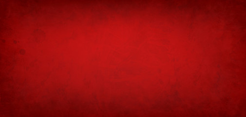 Red background with paint stains and spatter and old vintage grunge texture design, elegant rich Christmas red color for the holidays