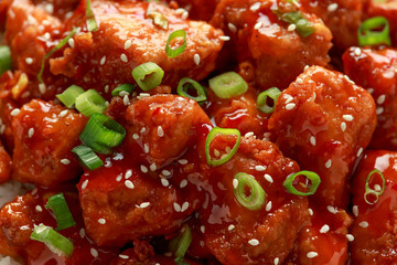 Tso's chicken with rice, green onion and broccoli