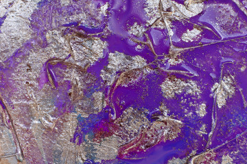 Palette with wet paint. Background with metal oxidation effect. blending shades of purple and silver
