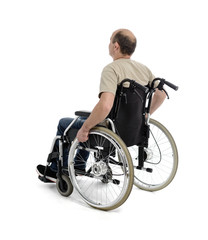 Obraz premium Mann Person Patient im Rollstuhl Rückansicht