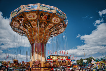 Amusement ride seat swing at a carnival