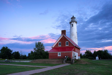 Fototapeta premium Tawas Point Lighthouse at Sunset