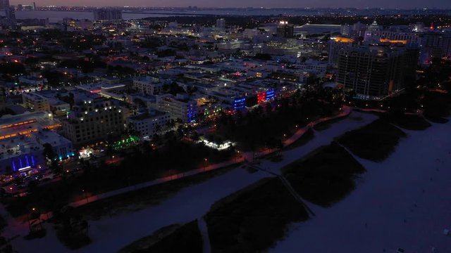 Night neon lights city miami beach aerials 4k