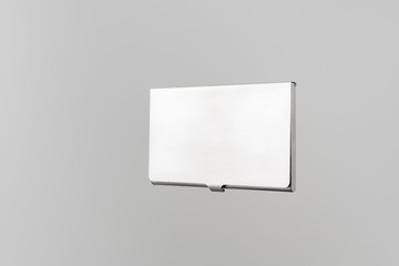 top view of business card with case on white