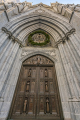 New York City, NY, USA - December, 2018 - The Cathedral of St. Patrick is a decorated Neo-Gothic-style Roman Catholic cathedral church in the United States, located at Fifth Avenue.