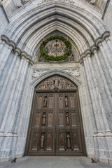 New York City, NY, USA - December, 2018 - The Cathedral of St. Patrick is a decorated Neo-Gothic-style Roman Catholic cathedral church in the United States, located at Fifth Avenue.