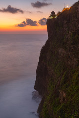 Sunset view over the sea from Uluwatu temple, Bali island