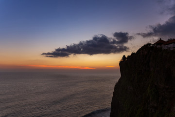 Fototapeta na wymiar Sunset view over the sea from Uluwatu temple, Bali island