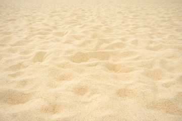 Fototapeta na wymiar Close up Beach sand in summer sun smooth texture as beautiful background.