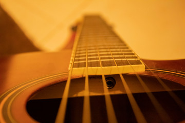 Obraz premium close up of an acoustic guitar
