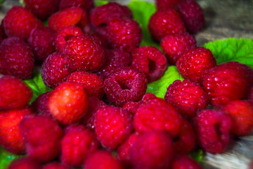 Fresh raspberries background close-up photo. Fresh organic fruit.