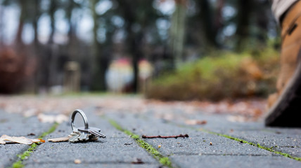 Man walking away from lost home keys