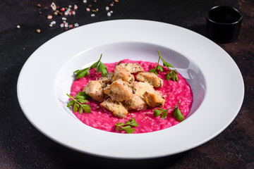 Delicious risotto with roasted pieces of chicken fillet. Risotto with chicken pieces. 