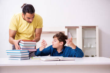 Fototapeta premium Father helping his son to prepare for school