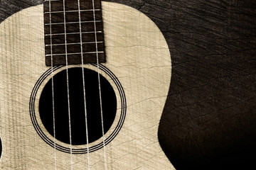 Obraz premium acoustic guitar on wooden background