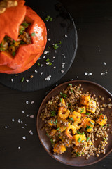 Baked Halloween pumpkin stuffed with lentil salad