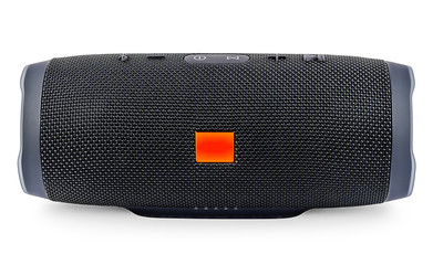 Wireless Speaker Isolated on White Background. Black Sound Speaker with Ribbed Texture and Control...