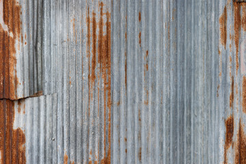 Rusted galvanized iron texture..Closeup of flaw old zinc sheet partition with rusted texture in...
