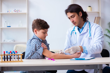 Fototapeta premium Boy in blood tranfusion concept