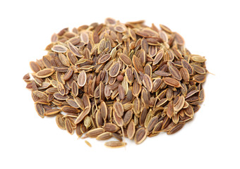 Pile of dill seeds on white background