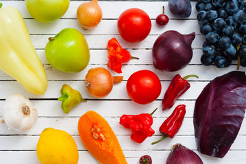 fruits and vegetables on white wood table