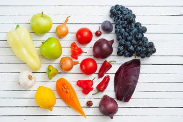 fruits and vegetables on white wood table