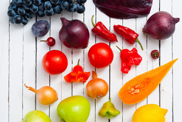 fruits and vegetables on white wood table