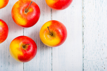 apple fruits on old white wooden table
