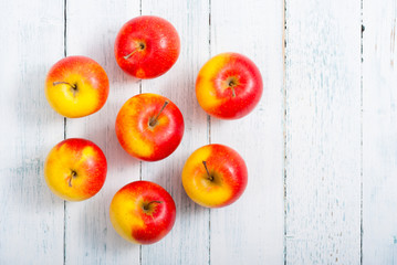 apple fruits on old white wooden table